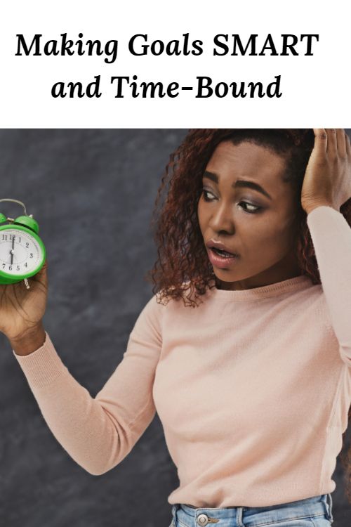 time-bound african american woman with a clock and the words "Make your goals time-bound if you want to successfully reach your goals. Never forget that the best goals are SMART. So, as you go about setting goals keep this in mind."