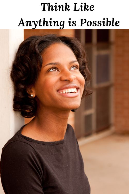 A smiling African-American woman looking upward and the words :Thinking Like Anything is Possible"