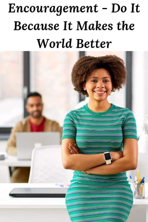 African American business woman at work and th words "Encouragement Do It Because It Makes the World Better"