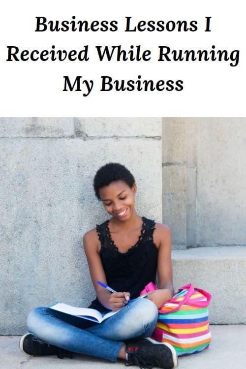 African American woman sitting outside with books studying and the words "Business Lessons I Received While Running My Business"
