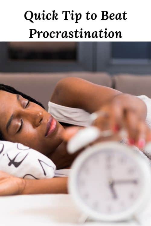 African American woman asleep in bed with a clock and the words "Quick Tip to Beat Procrastination"