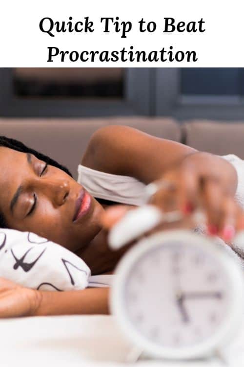 African American woman asleep in bed with a clock and the words "Quick Tip to Beat Procrastination"