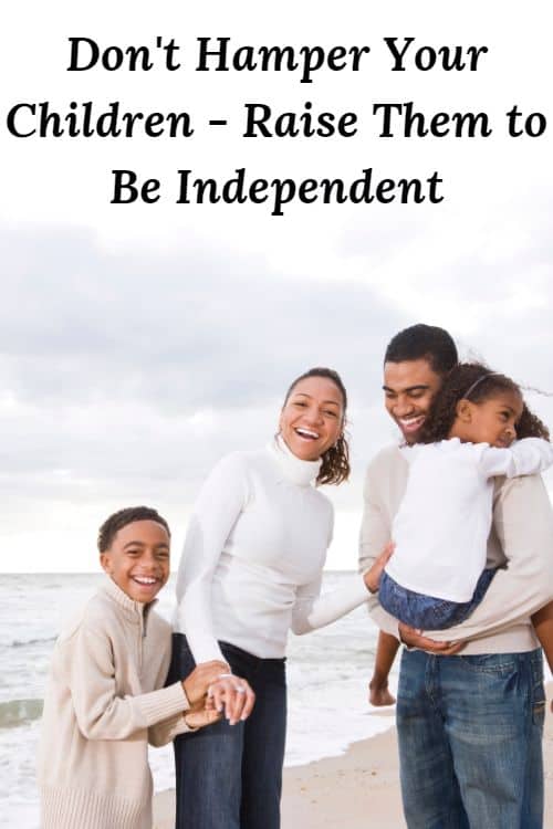 African American family at the beach and the words ""Don't Hamper Your Children - Raise Them to Be Independent"