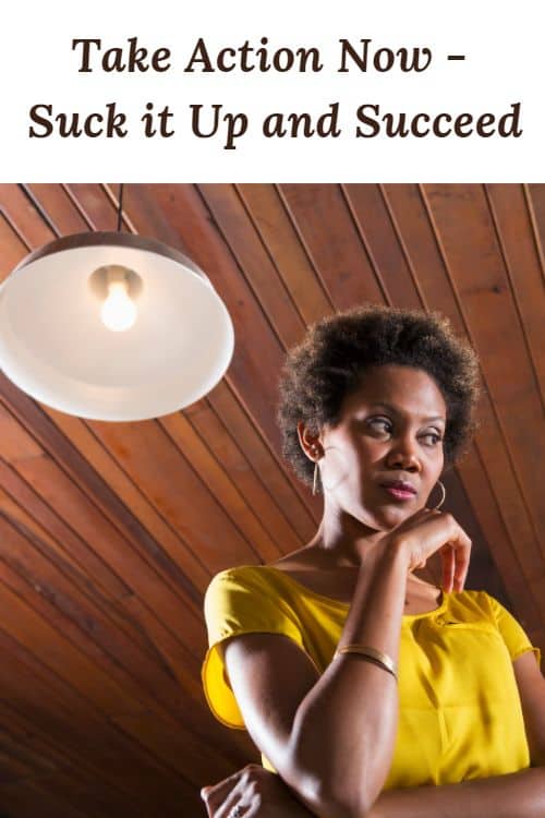 African American woman under a ceiling light and the words "Take Action Now - Suck it Up and Succeed"