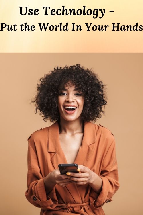 african american woman with cell phone and the words Use Technology - Put the World in Your Hands