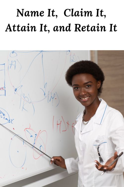 African American woman professor at a white board and the words "Name It Claim It Attain It and Retain It"