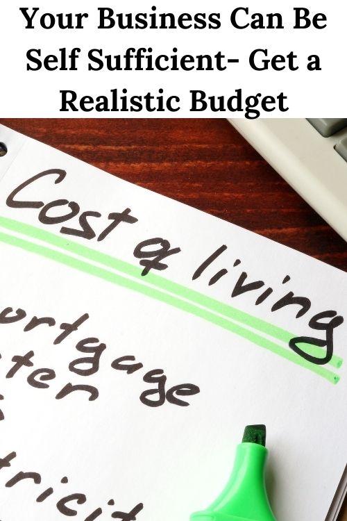 Notebook with writing on it and the words "Your Business Can Be Self Sufficient- Get a Realistic Budget"